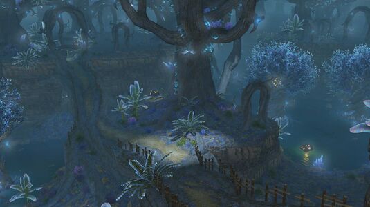 A massive root-bridge spans the middle of Cenote Jayunja