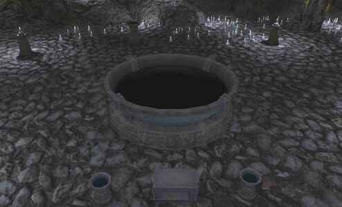 The ritual basin at the center of the chamber